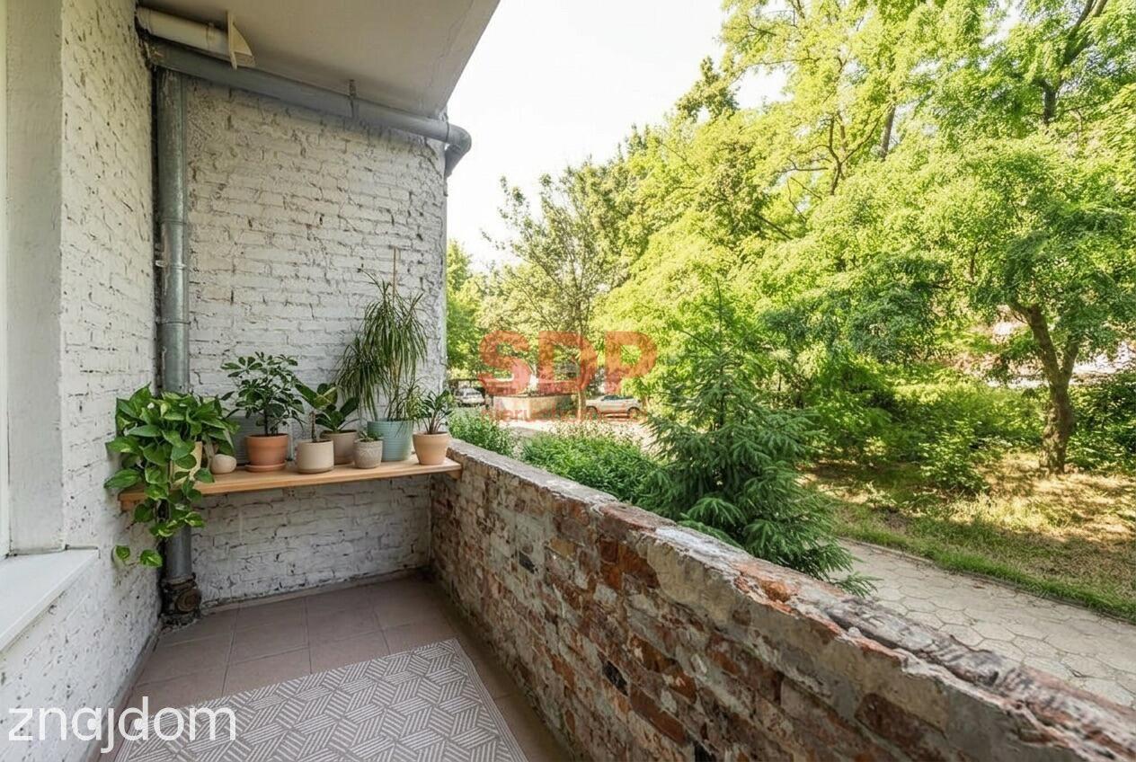 Klimatyczna kamienica po remoncie: 60 m², dębowe podłogi, balkon - zdjęcie 13
