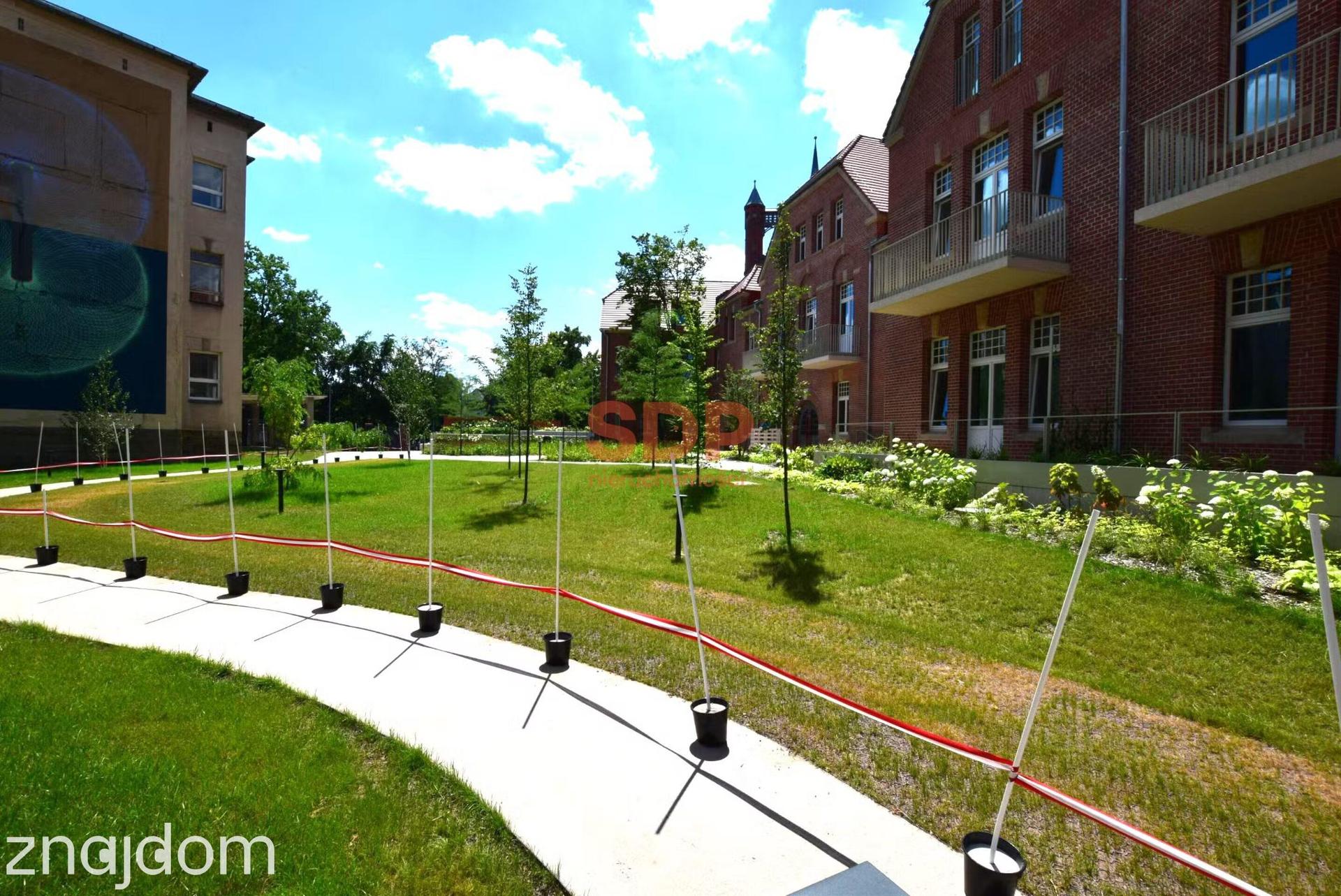 Apartament z widokiem na wewnętrzny ogród - zdjęcie 4
