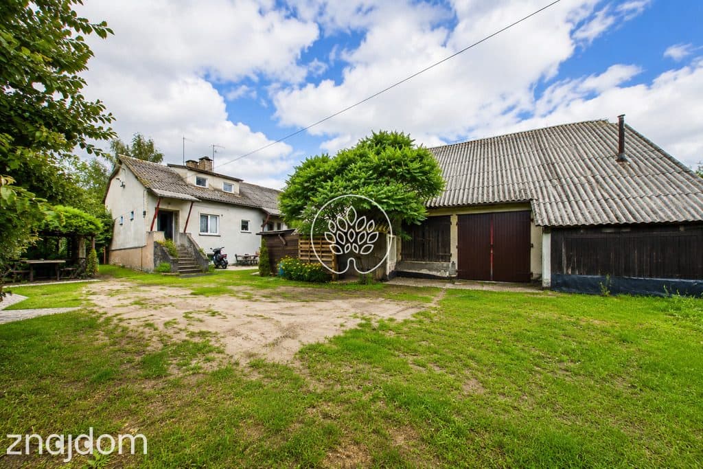 Dom z działką 1100 m² i wysokim garażem - zdjęcie 2