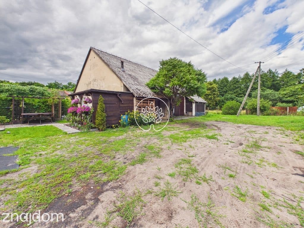 Dom z działką 1100 m² i wysokim garażem - zdjęcie 3