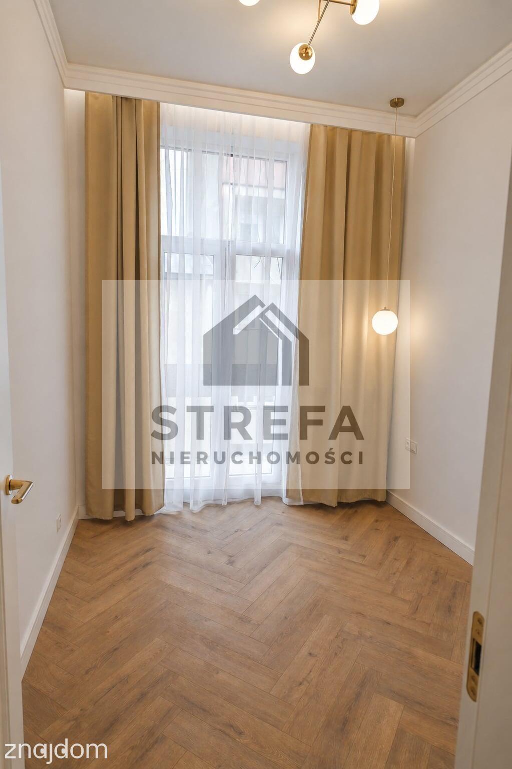 NOWOCZESNY APARTAMENT W SERCU TARNOWA – STYL, KLASA I KOMFORT - zdjęcie 12