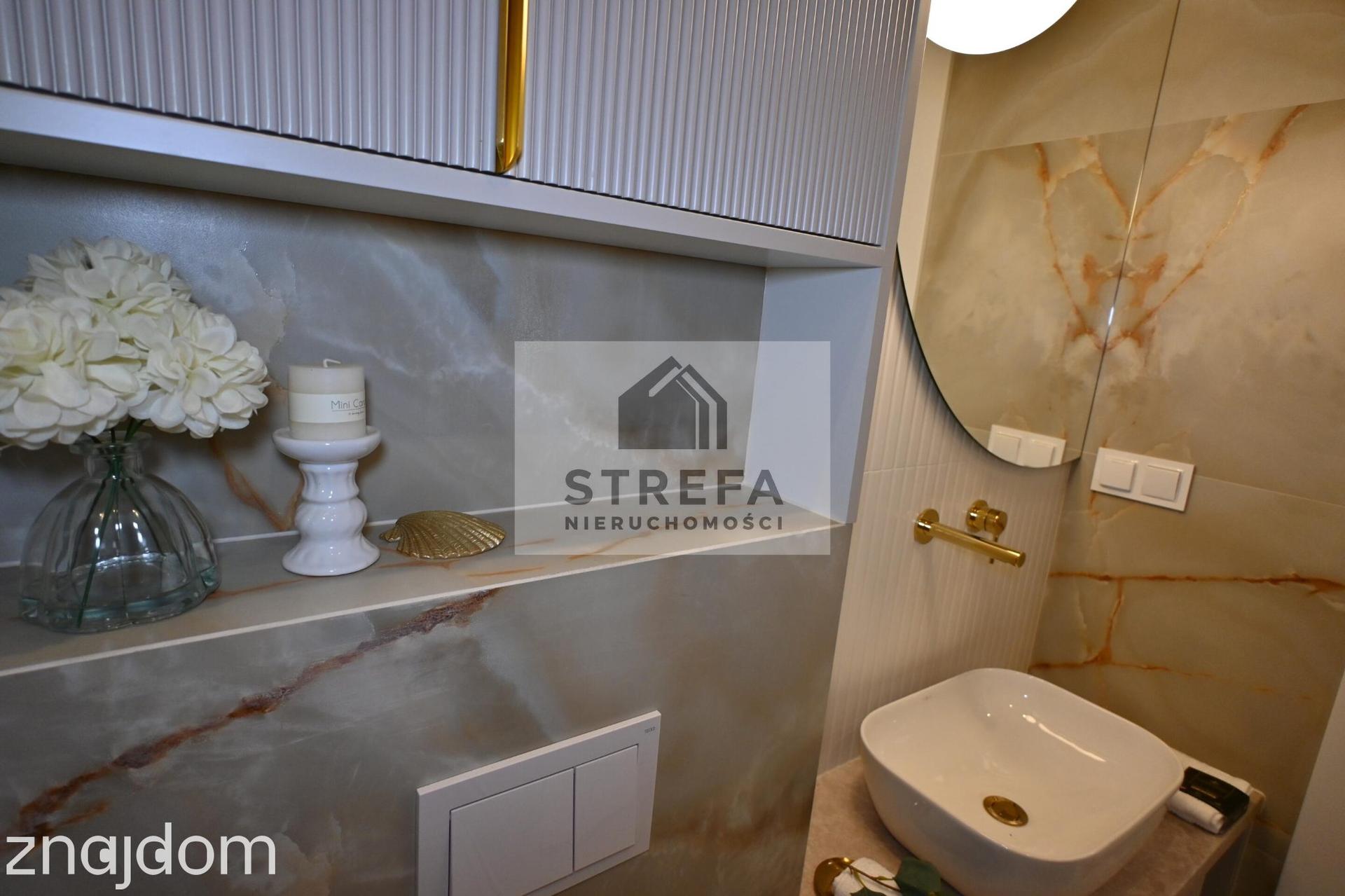 NOWOCZESNY APARTAMENT W SERCU TARNOWA – STYL, KLASA I KOMFORT - zdjęcie 14