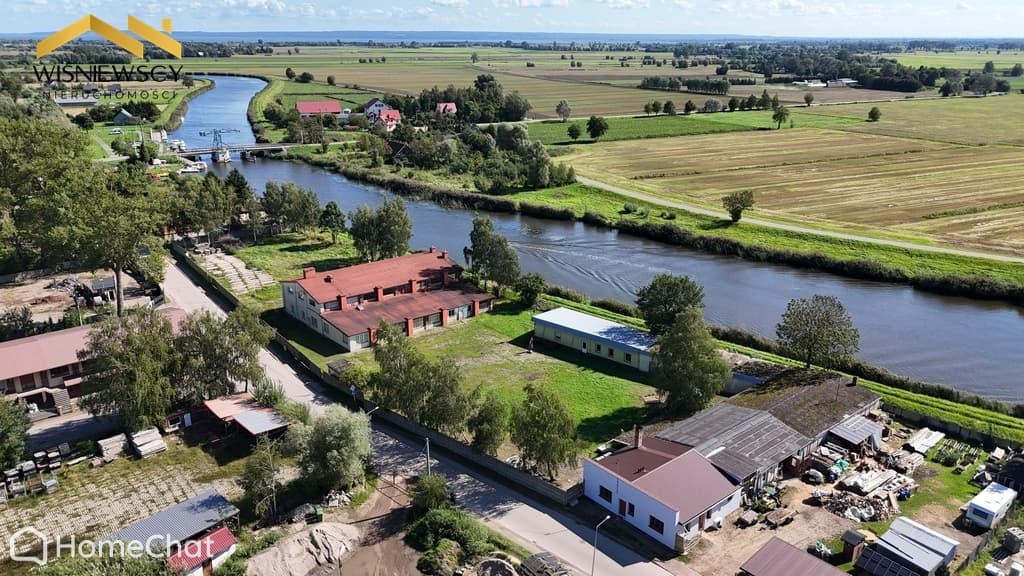 Działka o pow. 2300 mkw z budynkami o pow. 530 mkw
