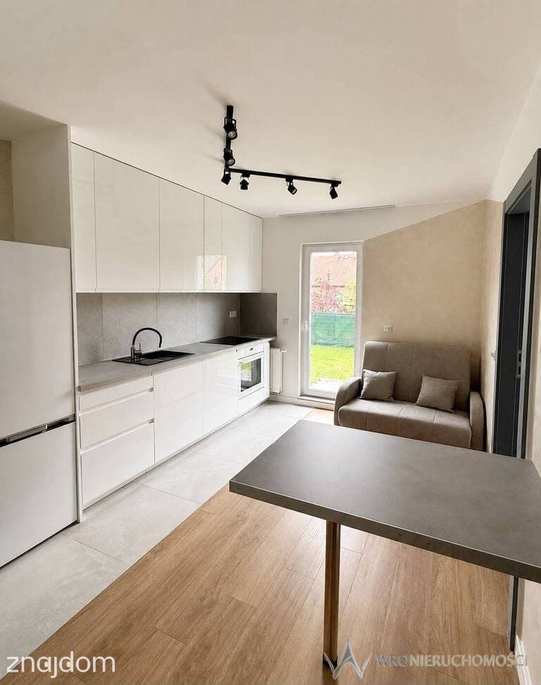 Nowoczesne 2-pokojowe mieszkanie z ogródkiem 30 m² - zdjęcie 3
