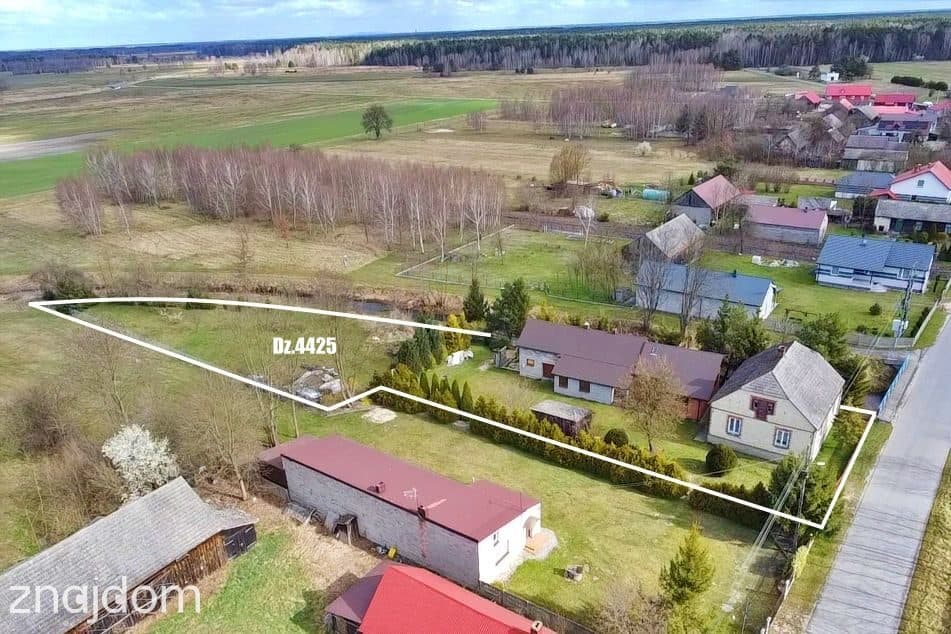 Dom nad rzeką w otoczeniu lasów - zdjęcie 2